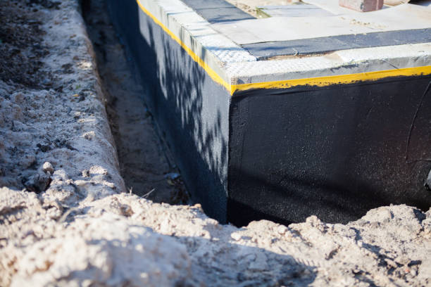 Professional Wet Basement Repair technician working in Kendall, NY